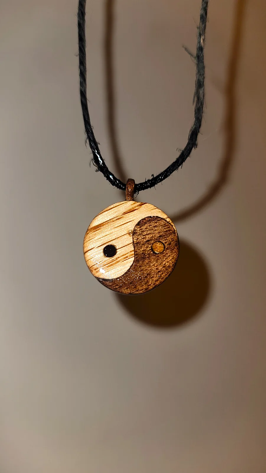 Finished wood yin-yang pendant