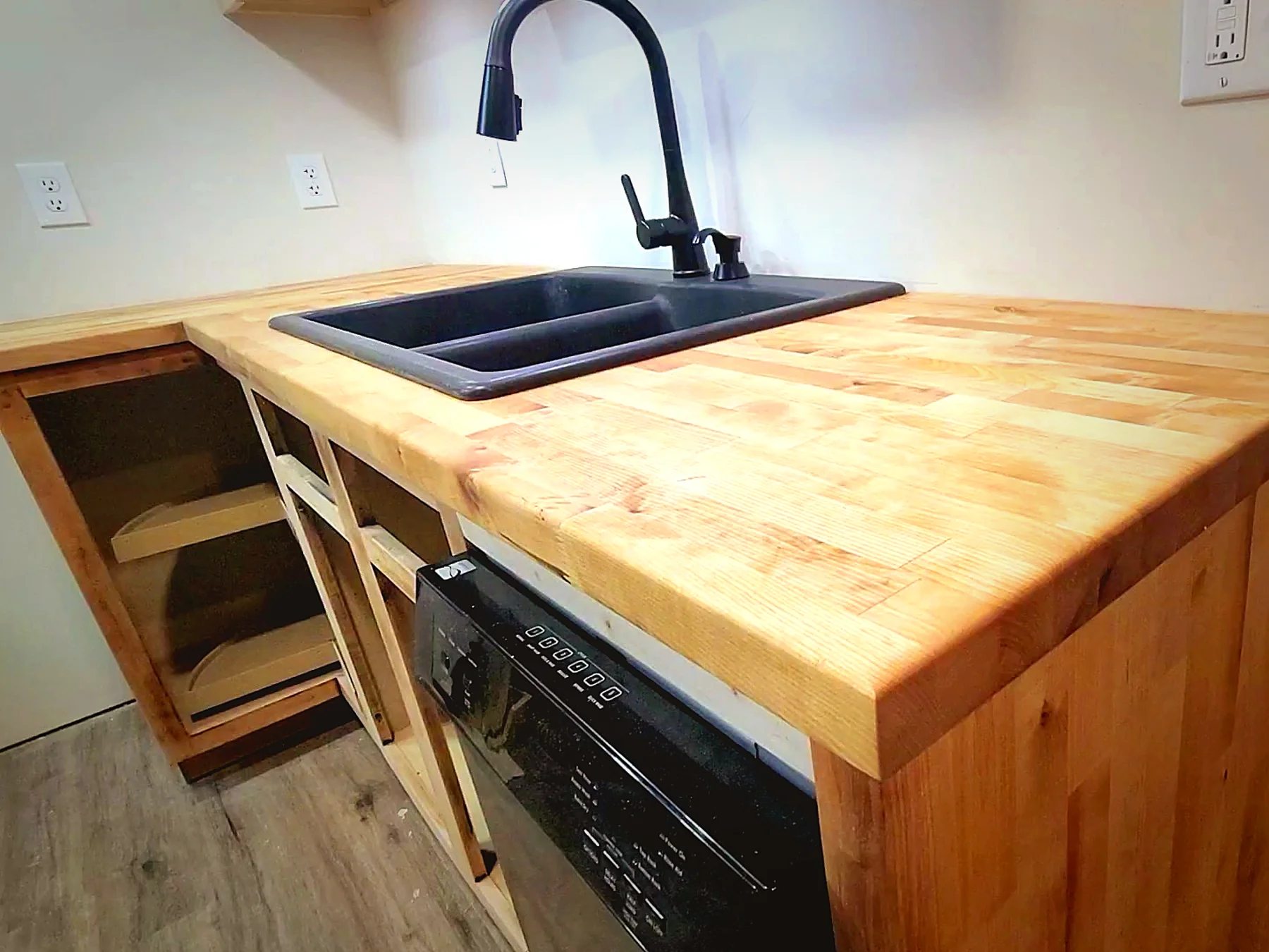 Basement remodel with custom butcher block counter and cabinetry